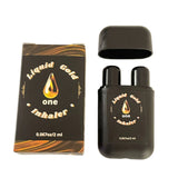 A black nose inhaler with the Liquid Gold One logo with the top off
